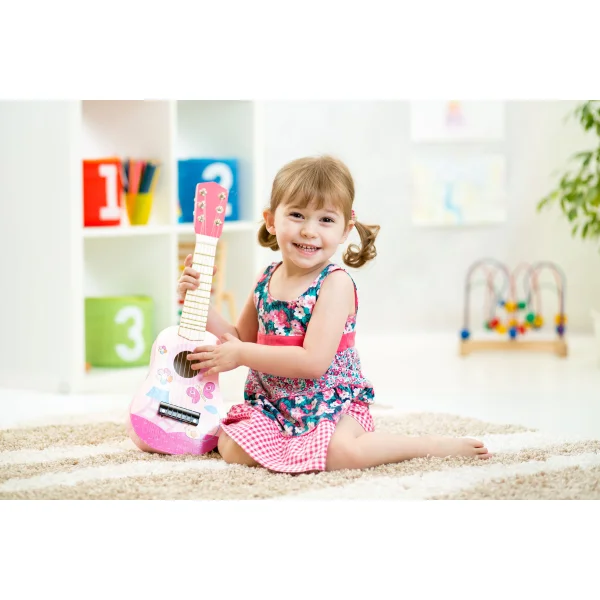 Gitara dla dzieci drewniana metalowe struny kostka - różowa ECOTOYS